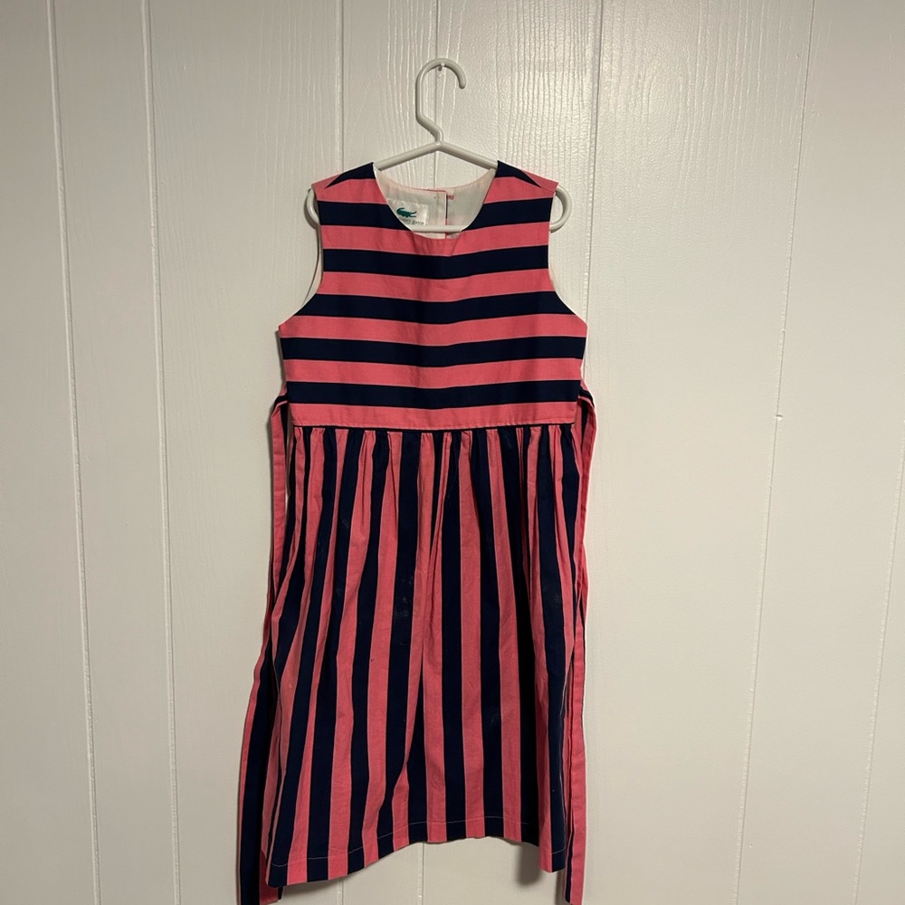 From the groovy gator boutique, girls pink and blue striped dress, size 8.